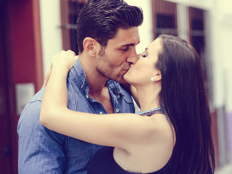 This man and woman aren't wondering why do people kiss, they're just enjoying it.