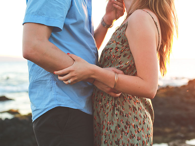 Two people using flirting body language to send the right signals.
