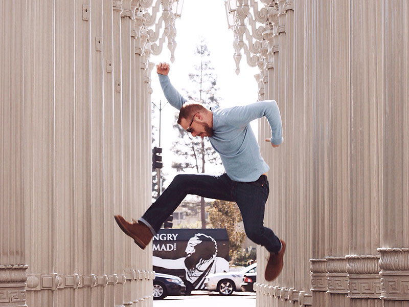 A guy who's feeling stronger after getting over someone jumping in the air.
