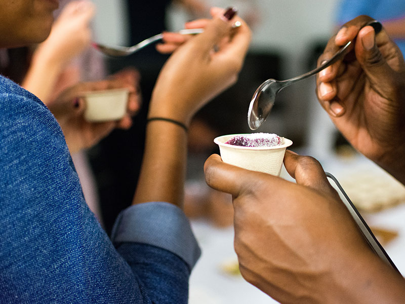 A couple in love eating ice cream and getting fat together.