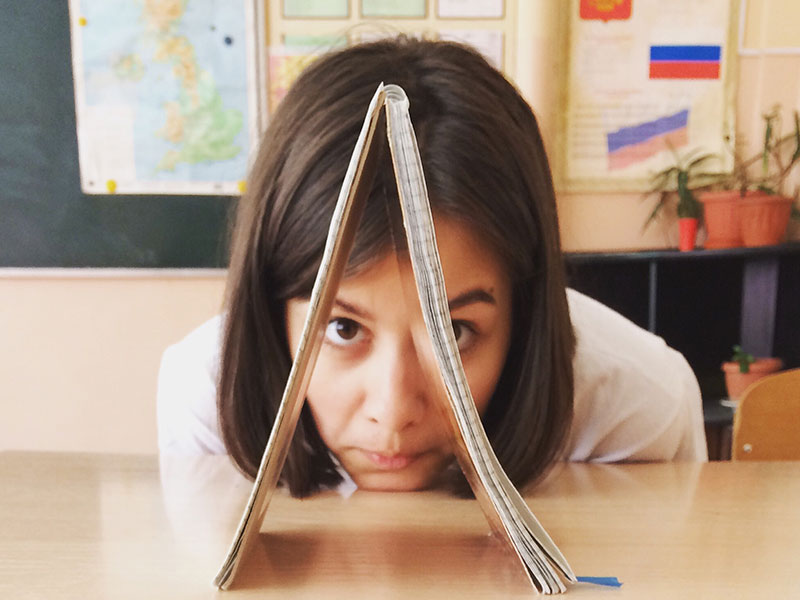 This 15-year-old girl staring at her notebook has some creative dating tips only a teenager could deliver.