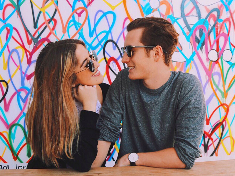 A woman looking at a guy she's into wondering what type of guys you're attracted to.