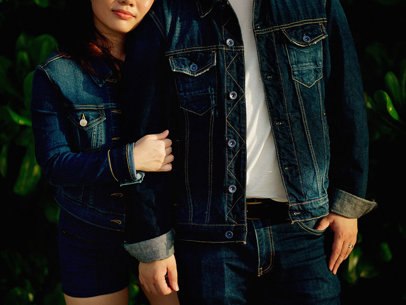 A couple wearing matching denim outfits who think about fashion and dating.