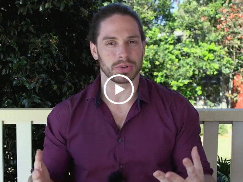 Mark Rosenfeld talking about the signs he wants to break up to the camera.