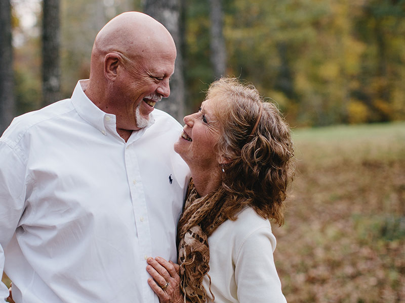 A couple over 60 dating and looking into each other's eyes.