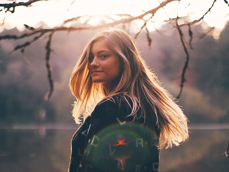 A woman who used one of these it's over quotes walking away into the sunset smiling.