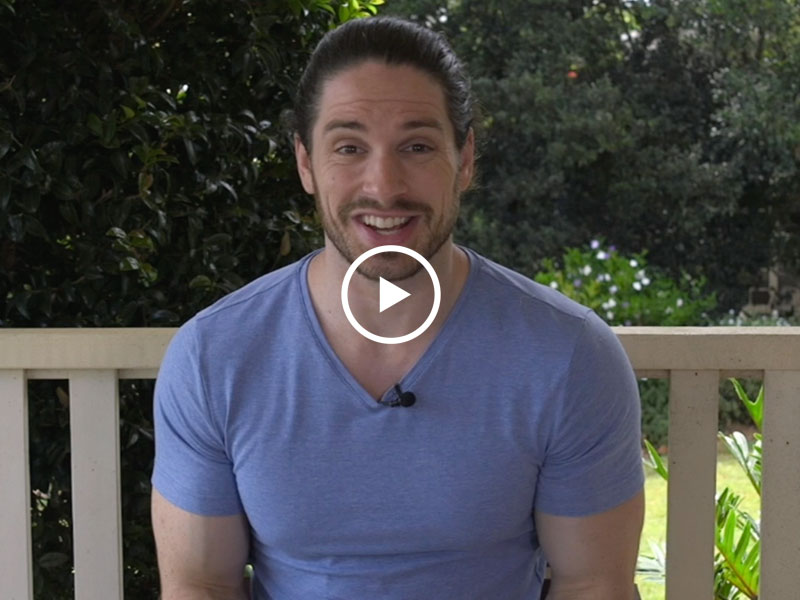 A guy talking about food and dating in a video still.