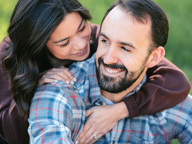 A couple who had the dtr talk, laughing and hugging now that they're officially a couple.