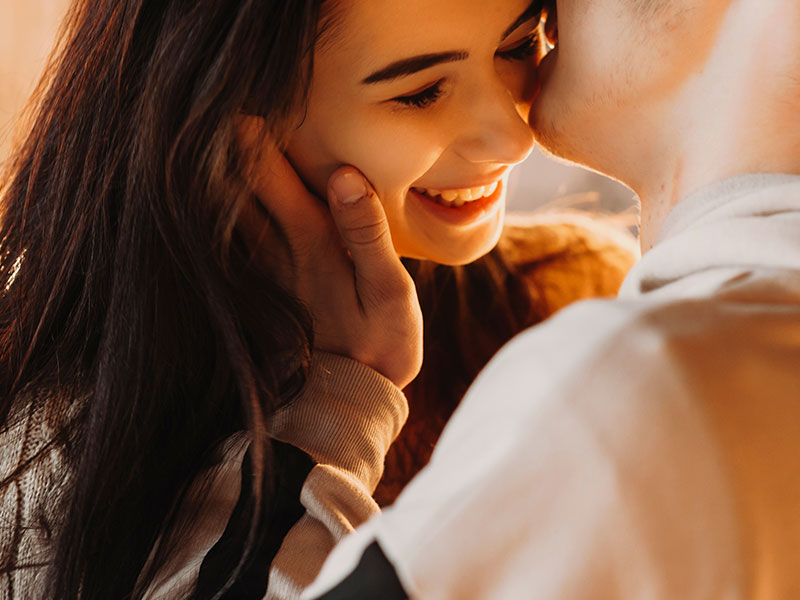 A guy kissing his girlfriend and calling her one of these pet names for girls.