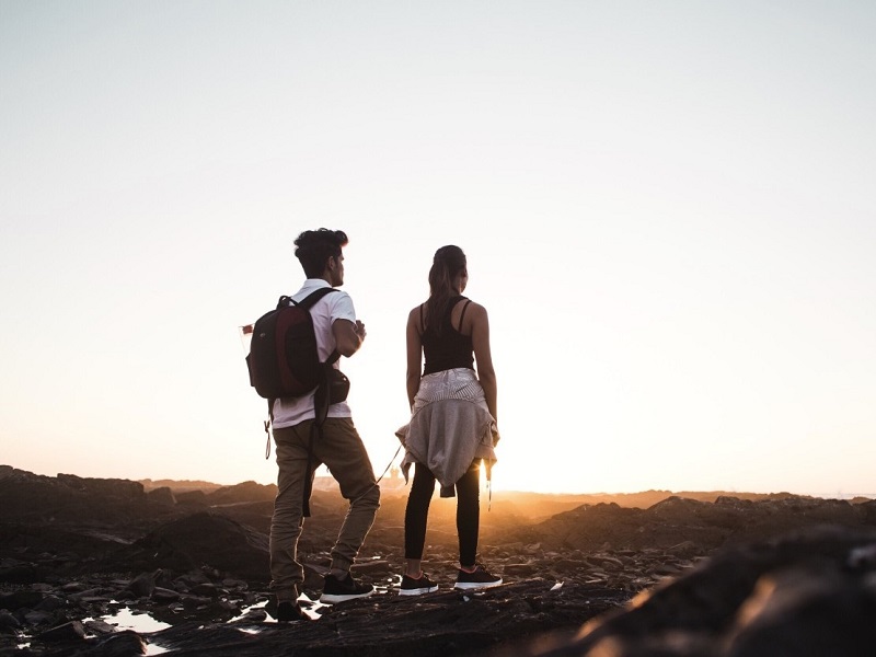 man and woman hiking being friends with an ex