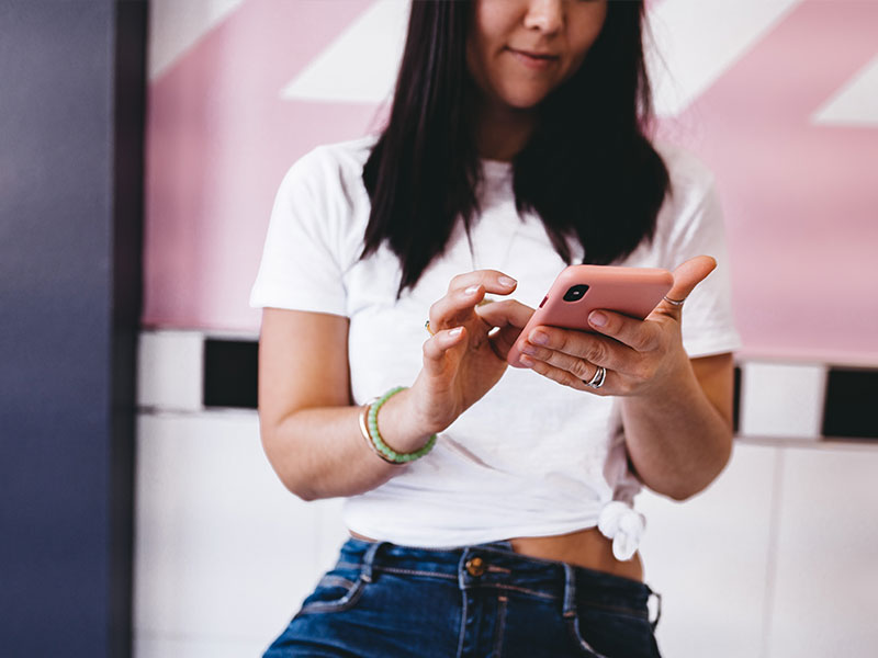 A woman using an online dating app.