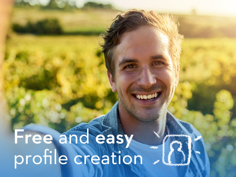 attractive man smiling in field answering is Zoosk free?