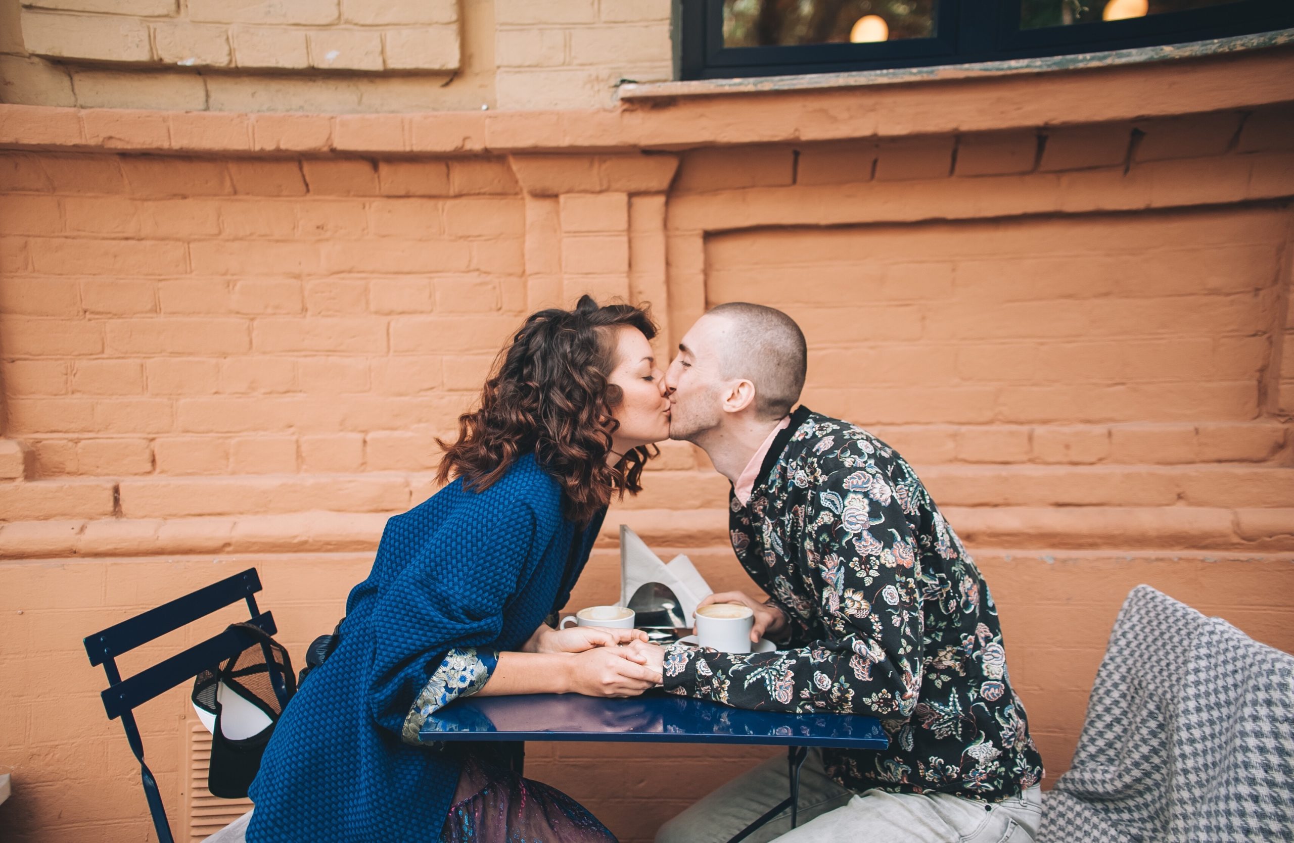 Happy couple kissing after trying international dating