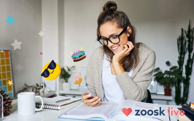 woman reading mobile phone and learning about Zoosk Live